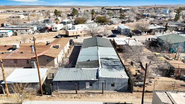 a picture of a table and chairs in the balcony