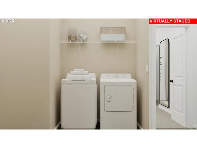a room with dryer and washer
