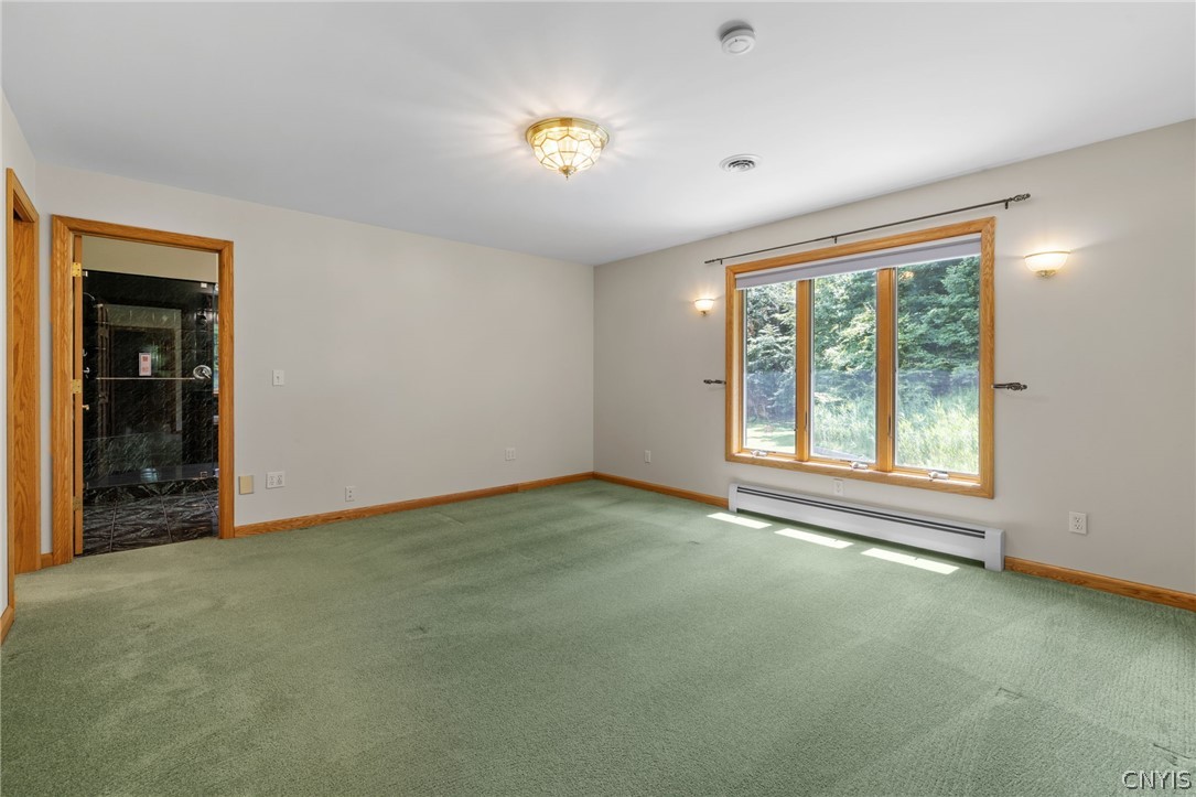 1103 Rail Fence Road Camillus, NY 13031 - Photo 33 of 50 Primary suite with baseboard hot water heat