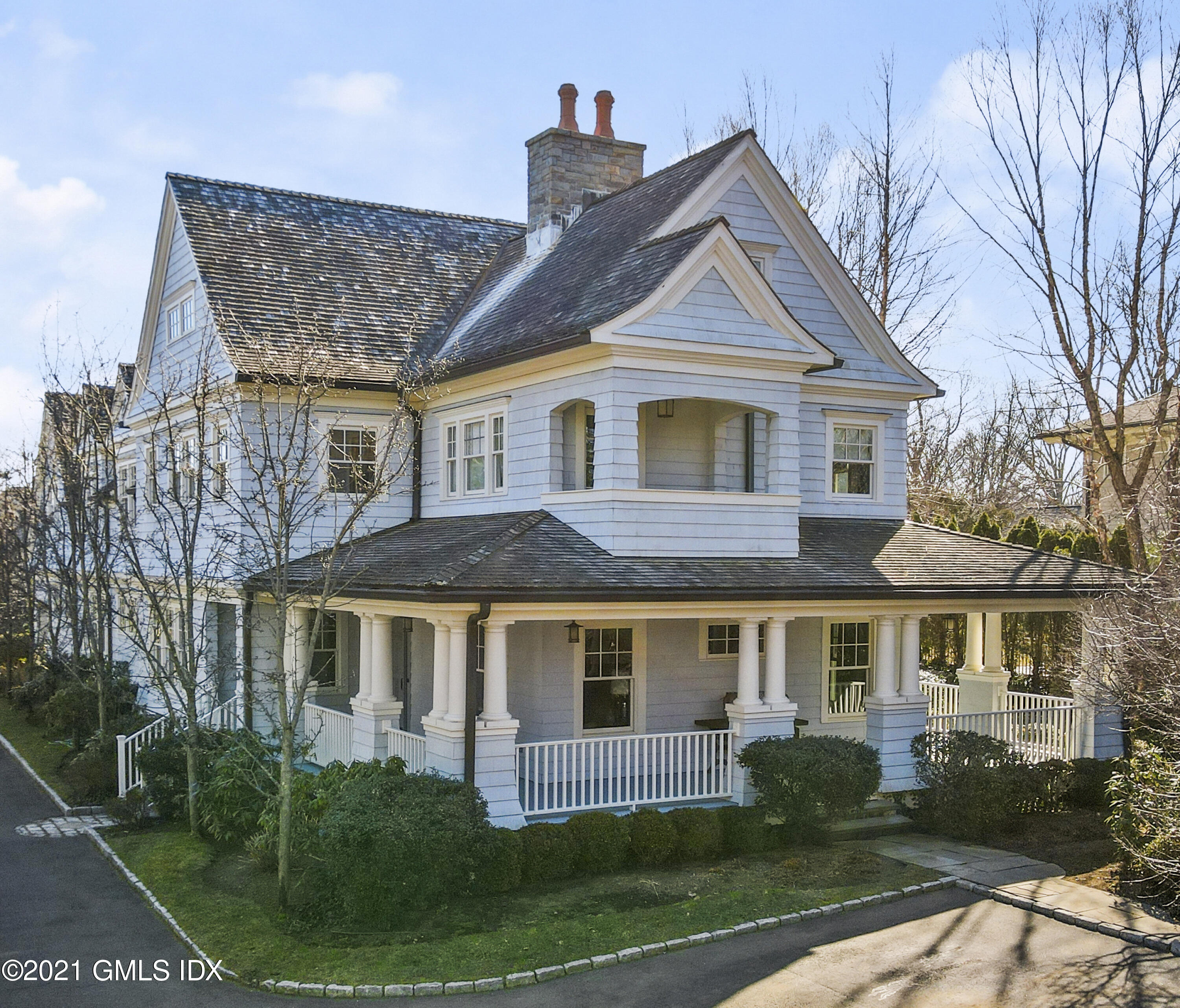 288 Riverside Avenue Riverside, CT 06878 - Photo 1 of 33 a front view of a house with a yard