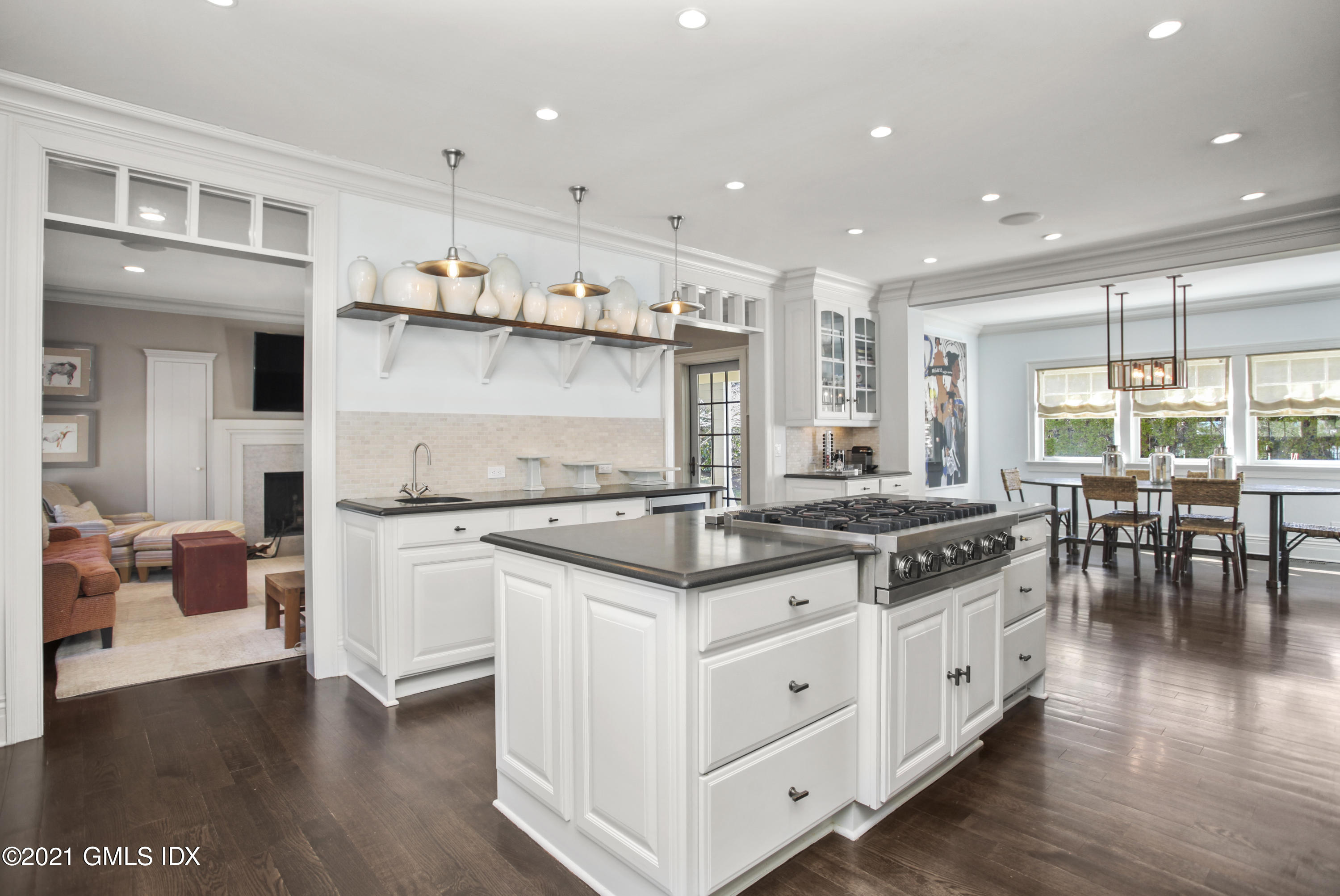 288 Riverside Avenue Riverside, CT 06878 - Photo 12 of 33 a kitchen with stainless steel appliances granite countertop a stove and a wooden floors