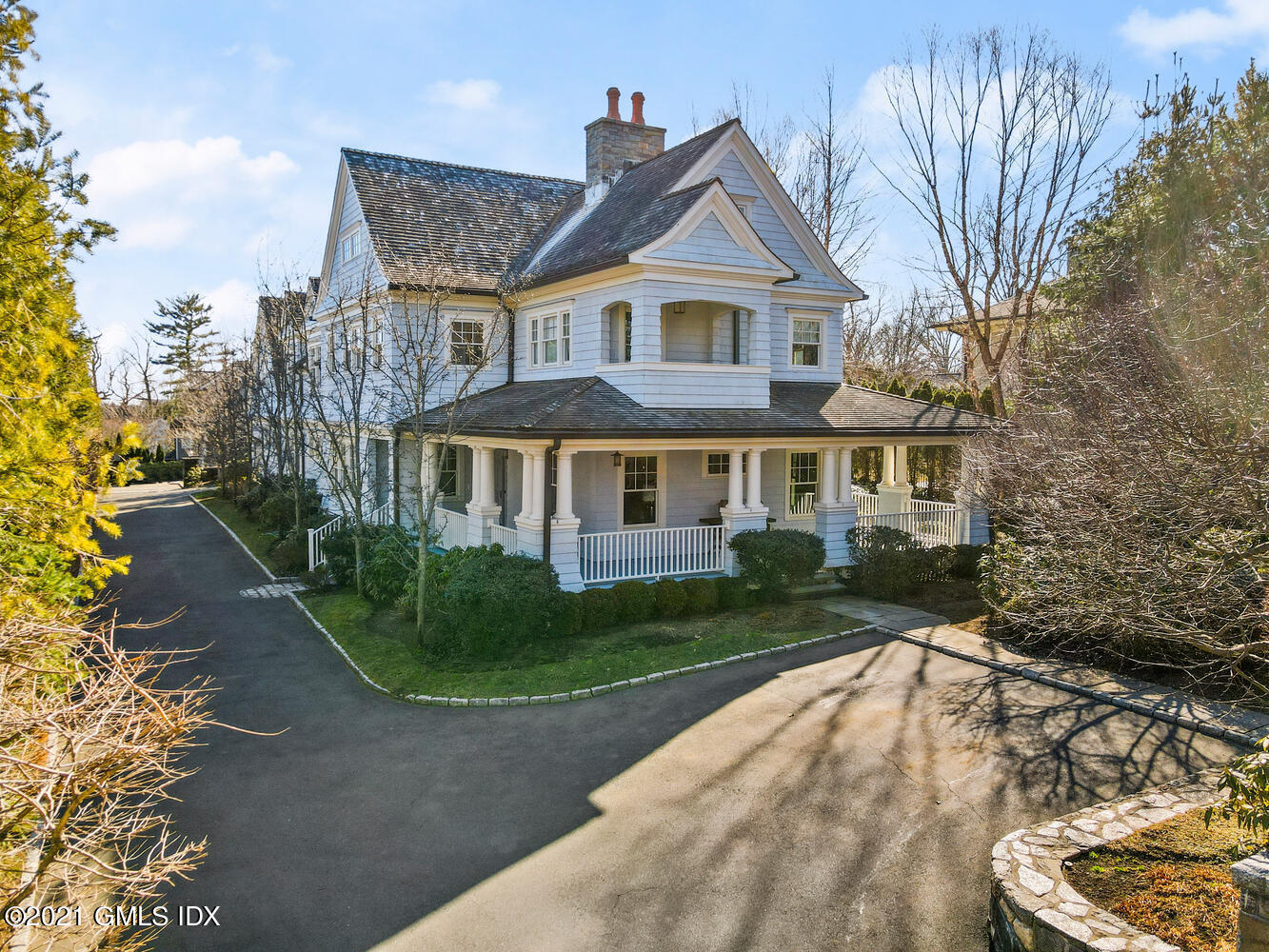 288 Riverside Avenue Riverside, CT 06878 - Photo 2 of 33 a front view of a house with a yard