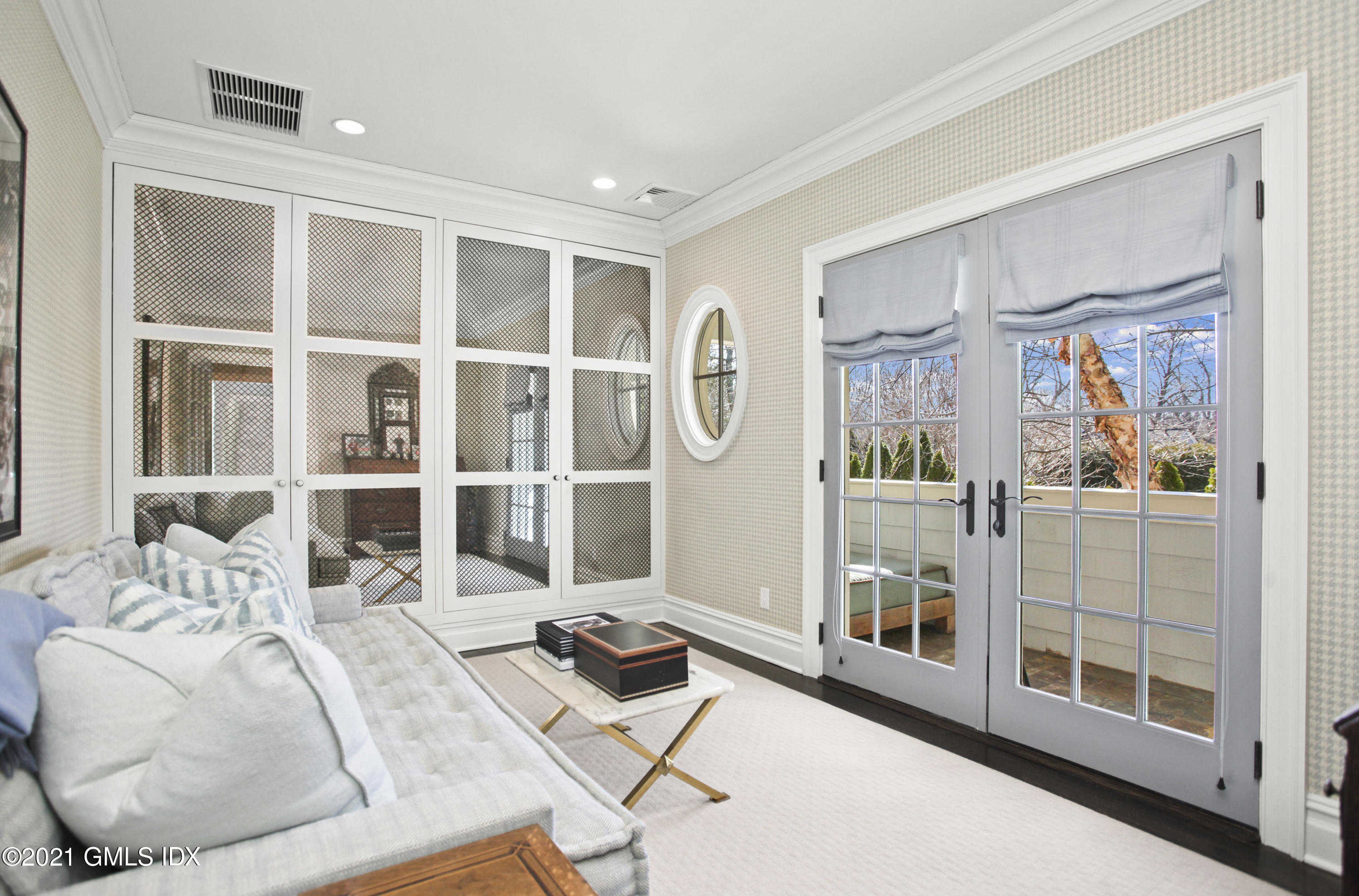 288 Riverside Avenue Riverside, CT 06878 - Photo 21 of 33 a living room with furniture cabinets and wooden floor