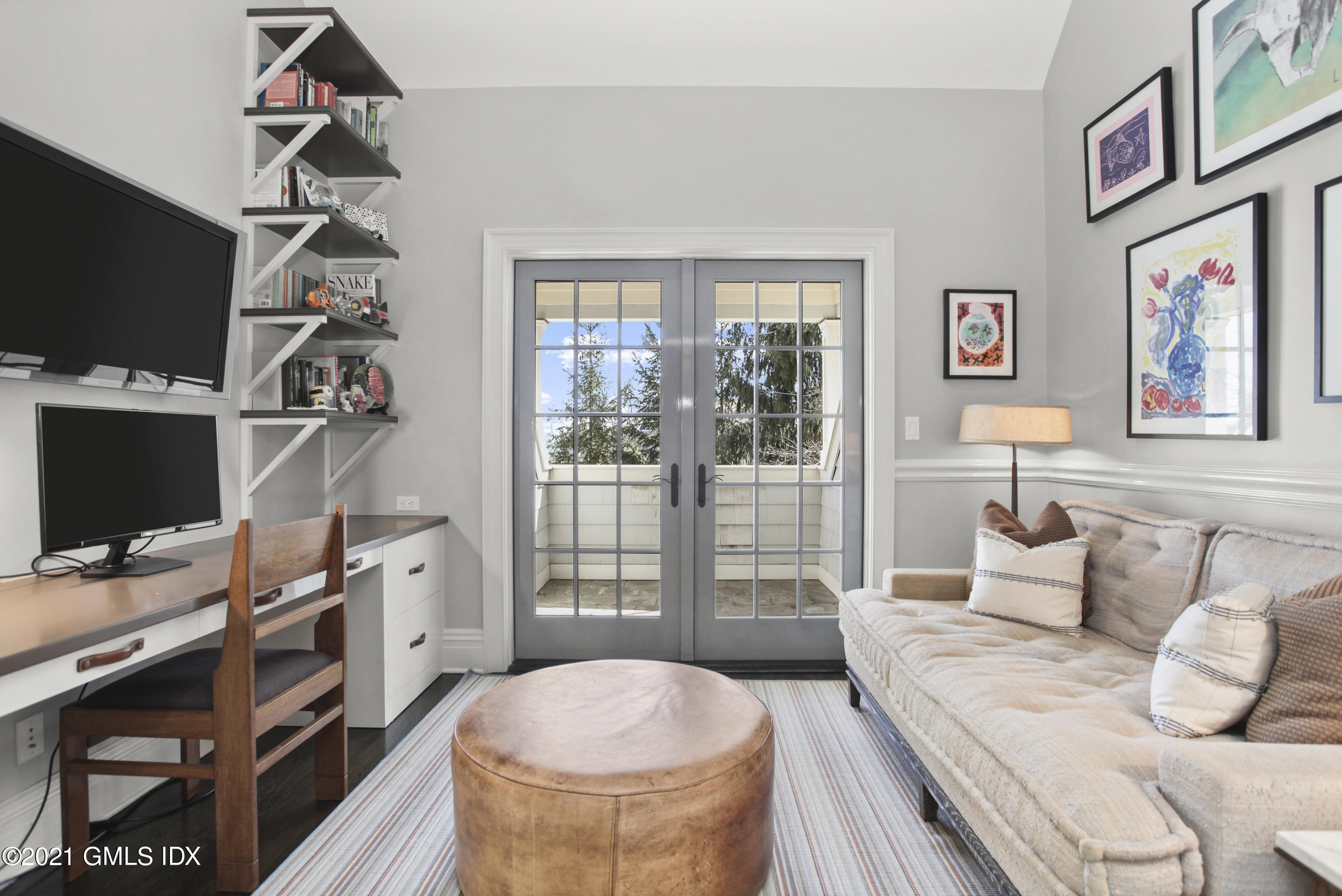 288 Riverside Avenue Riverside, CT 06878 - Photo 25 of 33 a bedroom with a bed and a flat screen tv