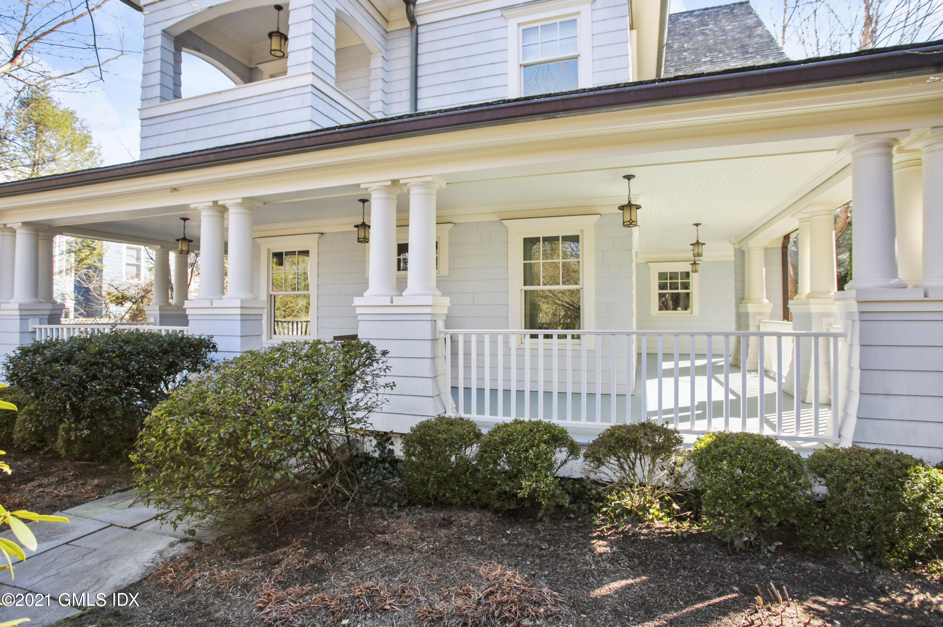 288 Riverside Avenue Riverside, CT 06878 - Photo 4 of 33 a front view of a house with a garden