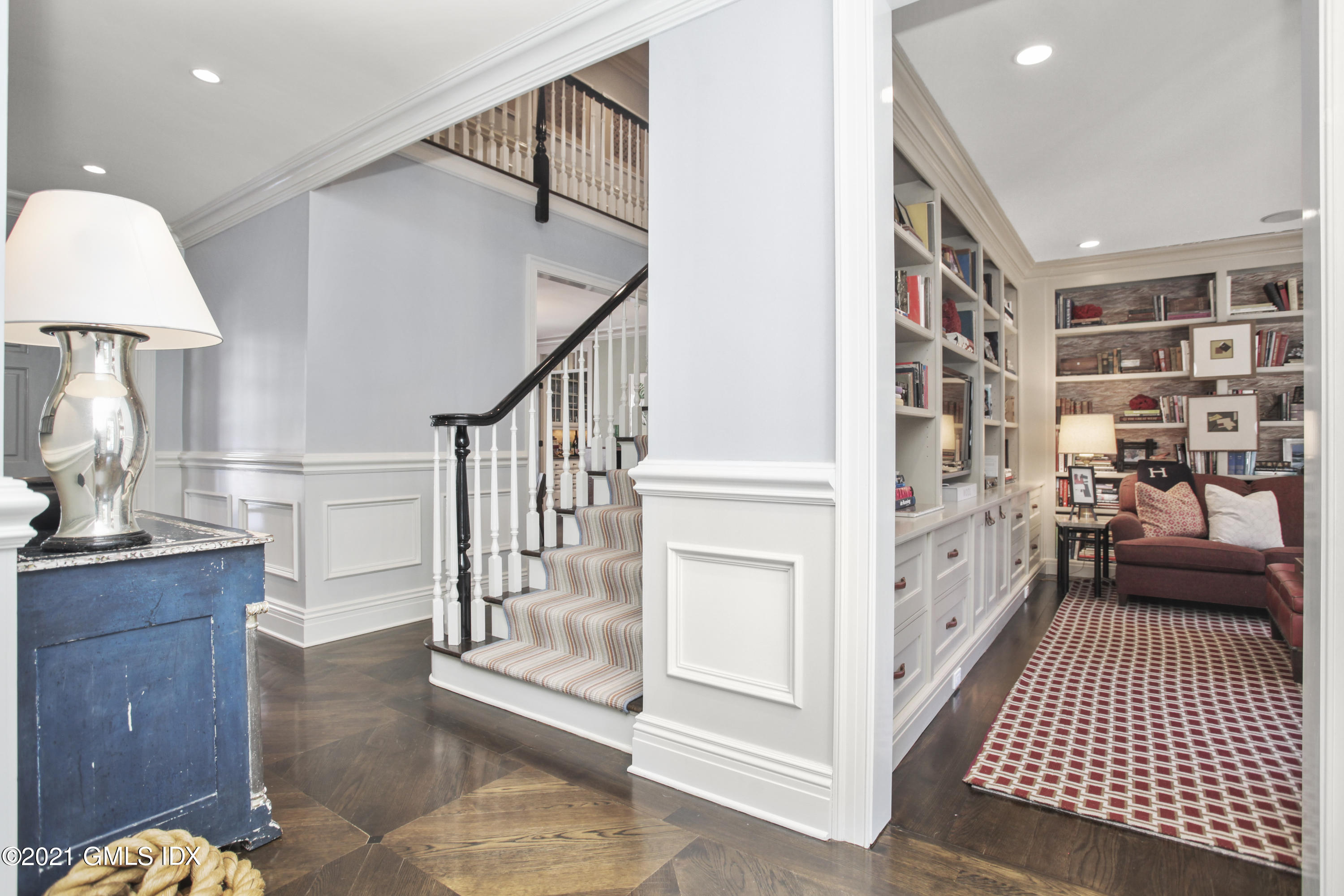 288 Riverside Avenue Riverside, CT 06878 - Photo 5 of 33 a view of a hallway with wooden floor and staircase