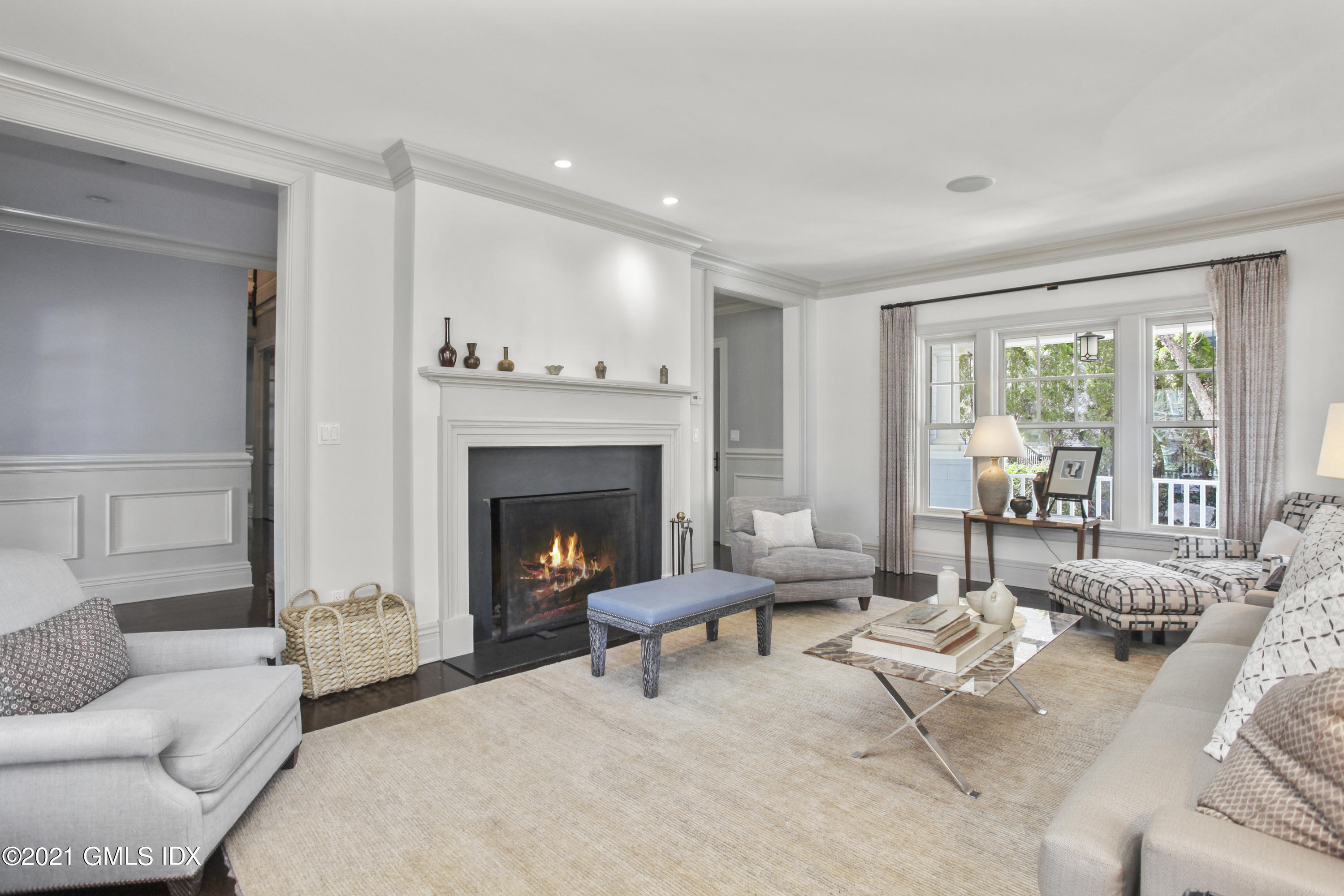 288 Riverside Avenue Riverside, CT 06878 - Photo 6 of 33 a living room with furniture and a fireplace