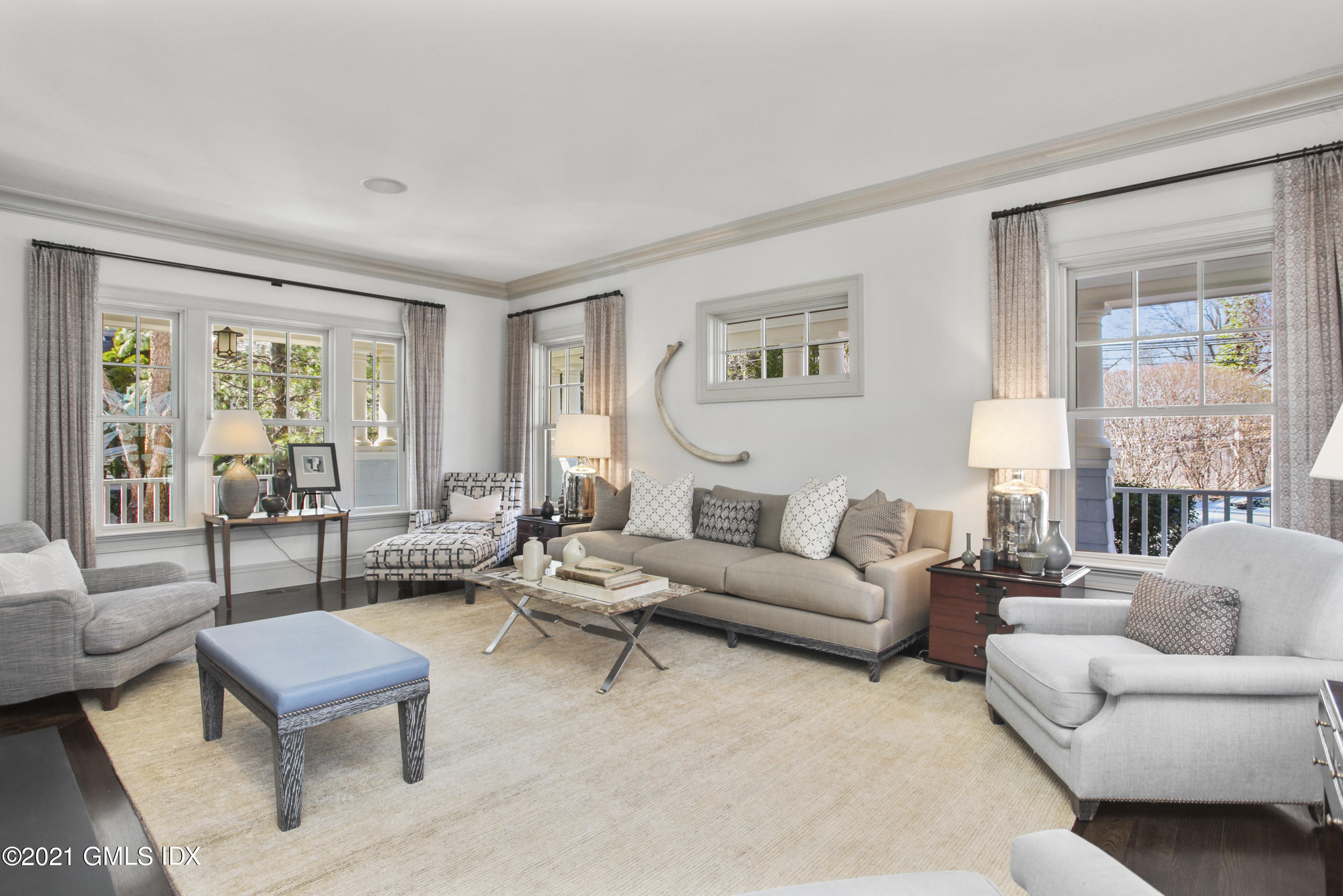 288 Riverside Avenue Riverside, CT 06878 - Photo 7 of 33 a living room with furniture and a large window