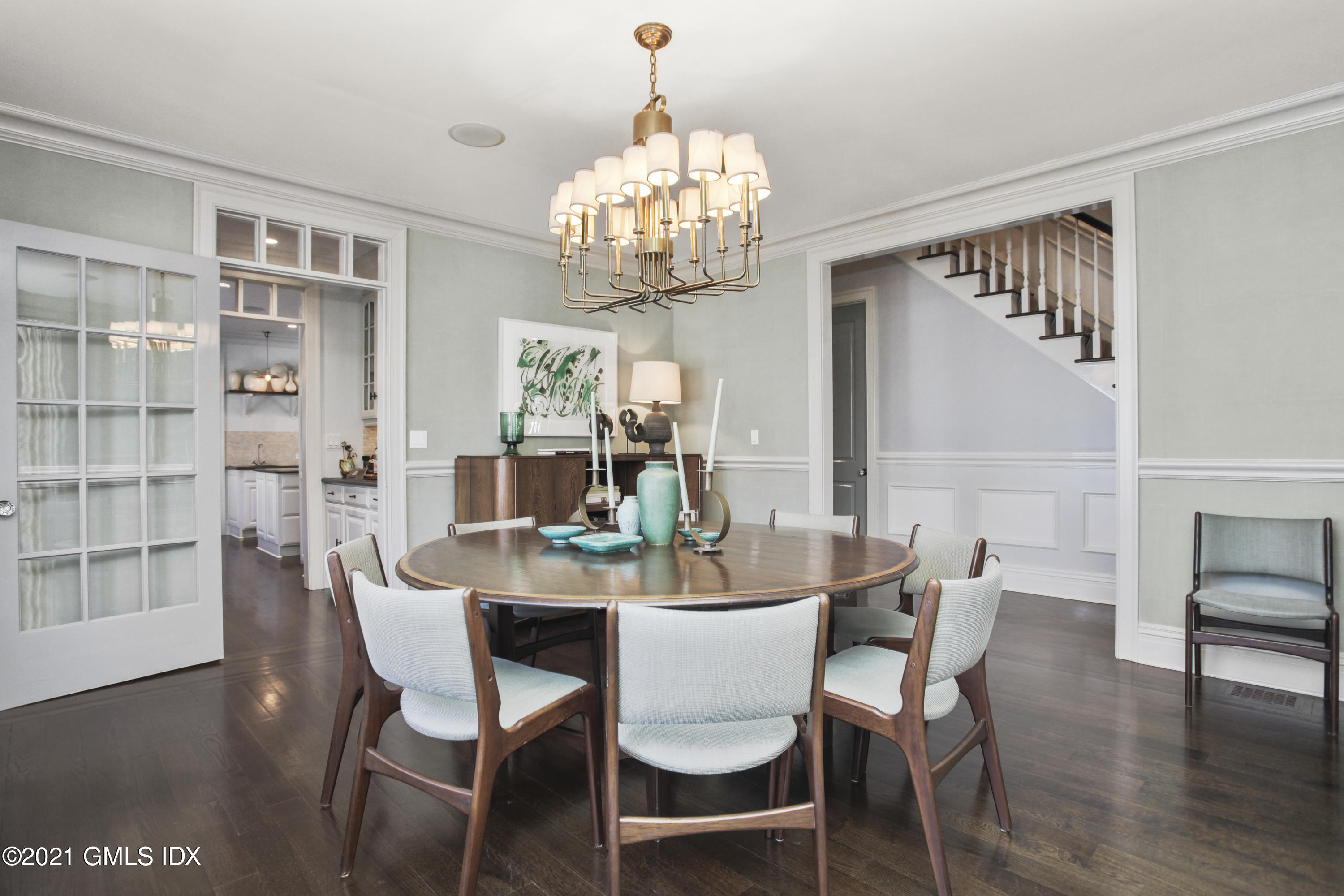 288 Riverside Avenue Riverside, CT 06878 - Photo 9 of 33 a view of a dining room with furniture wooden floor and chandelier