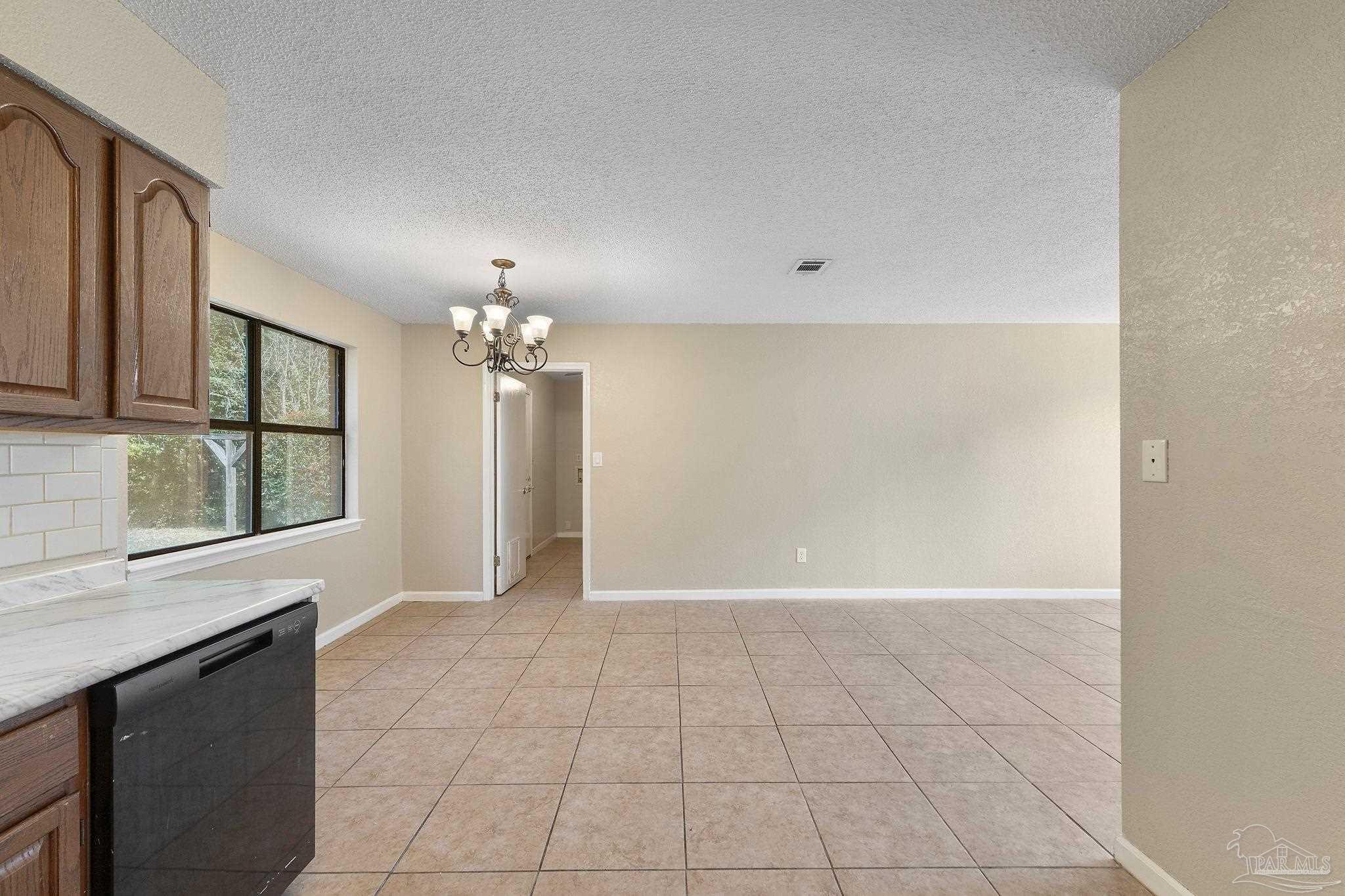 3135 Bent Oak Road Pensacola, FL 32526 - Photo 13 of 47 a view of an empty room with a window
