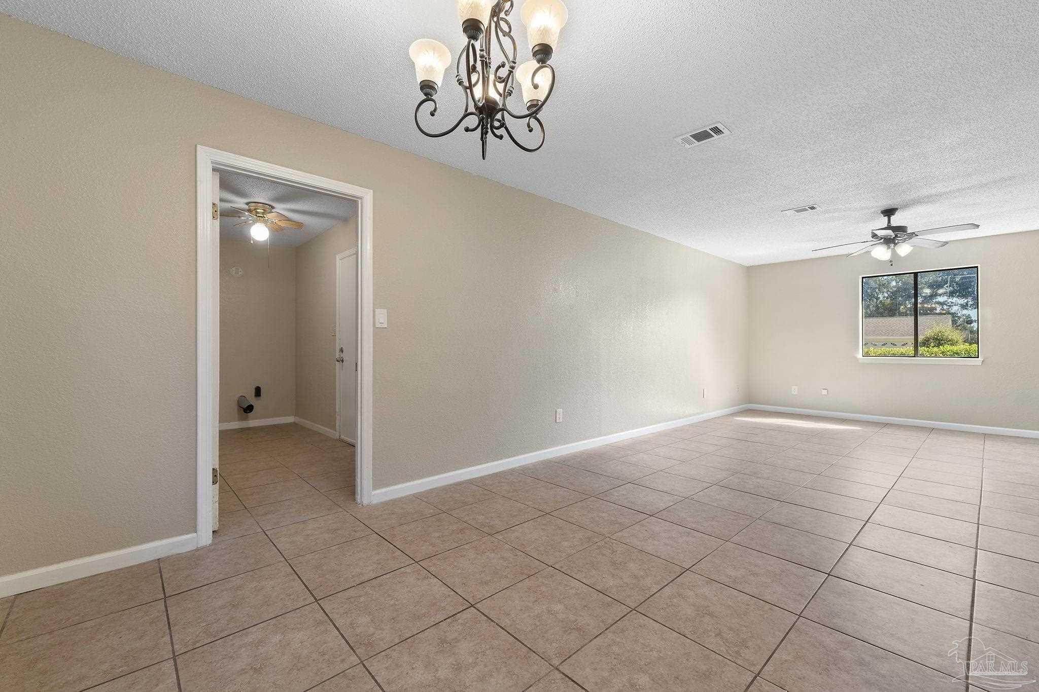 3135 Bent Oak Road Pensacola, FL 32526 - Photo 15 of 47 a view of an empty room with a window