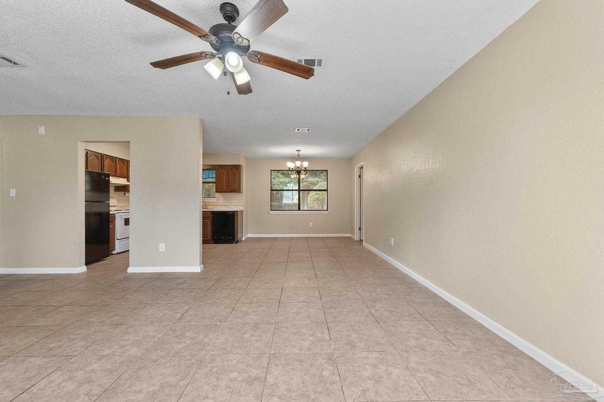 3135 Bent Oak Road Pensacola, FL 32526 - Photo 17 of 47 a view of an empty room with a window