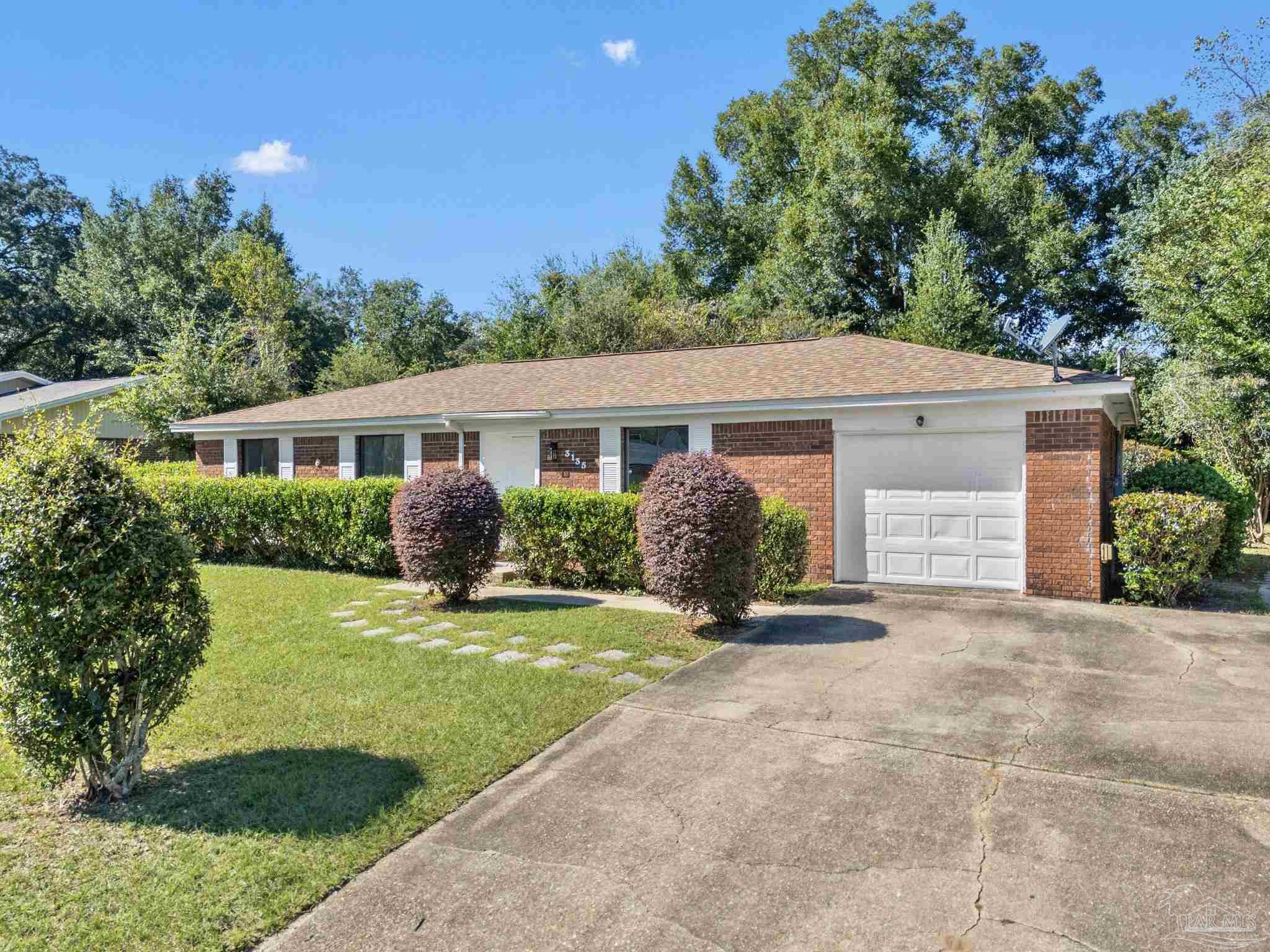 3135 Bent Oak Road Pensacola, FL 32526 - Photo 2 of 47 a front view of house with yard and green space