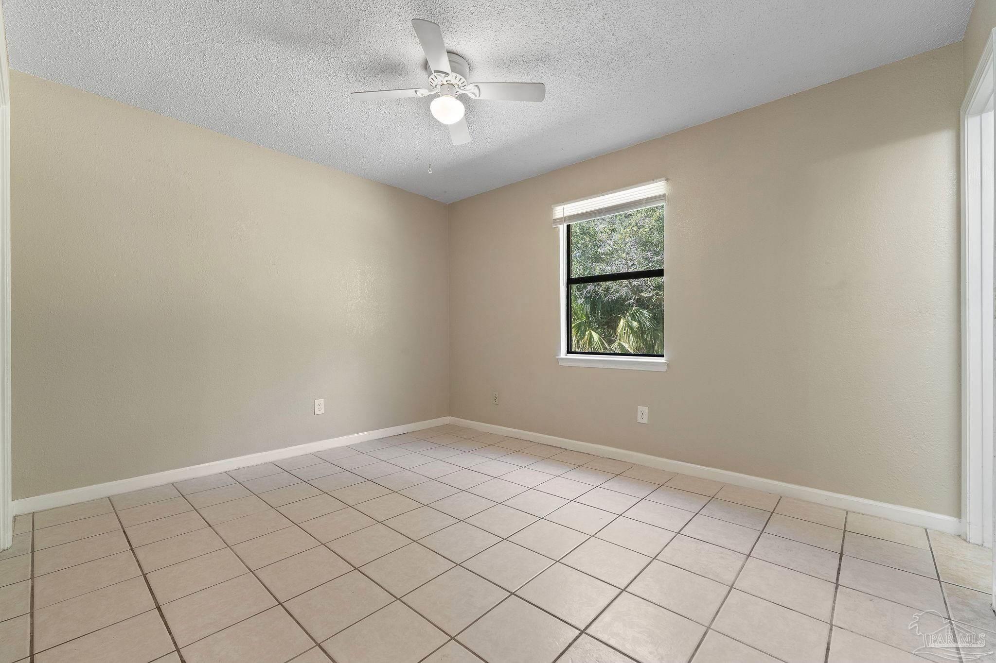 3135 Bent Oak Road Pensacola, FL 32526 - Photo 21 of 47 a view of an empty room with a window