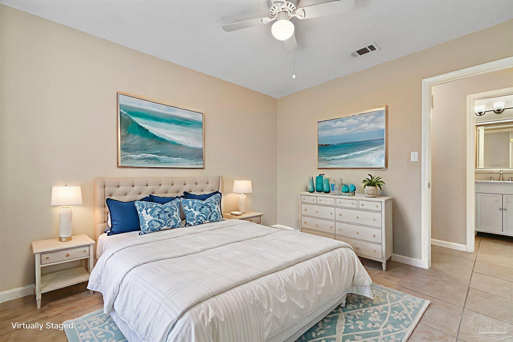 3135 Bent Oak Road Pensacola, FL 32526 - Photo 23 of 47 a bedroom with a bed and a painting