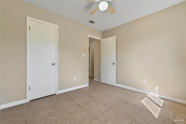 an empty room with a bathroom