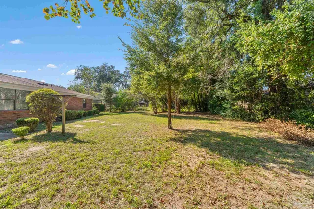 an aerial view of a city with lots of residential buildings