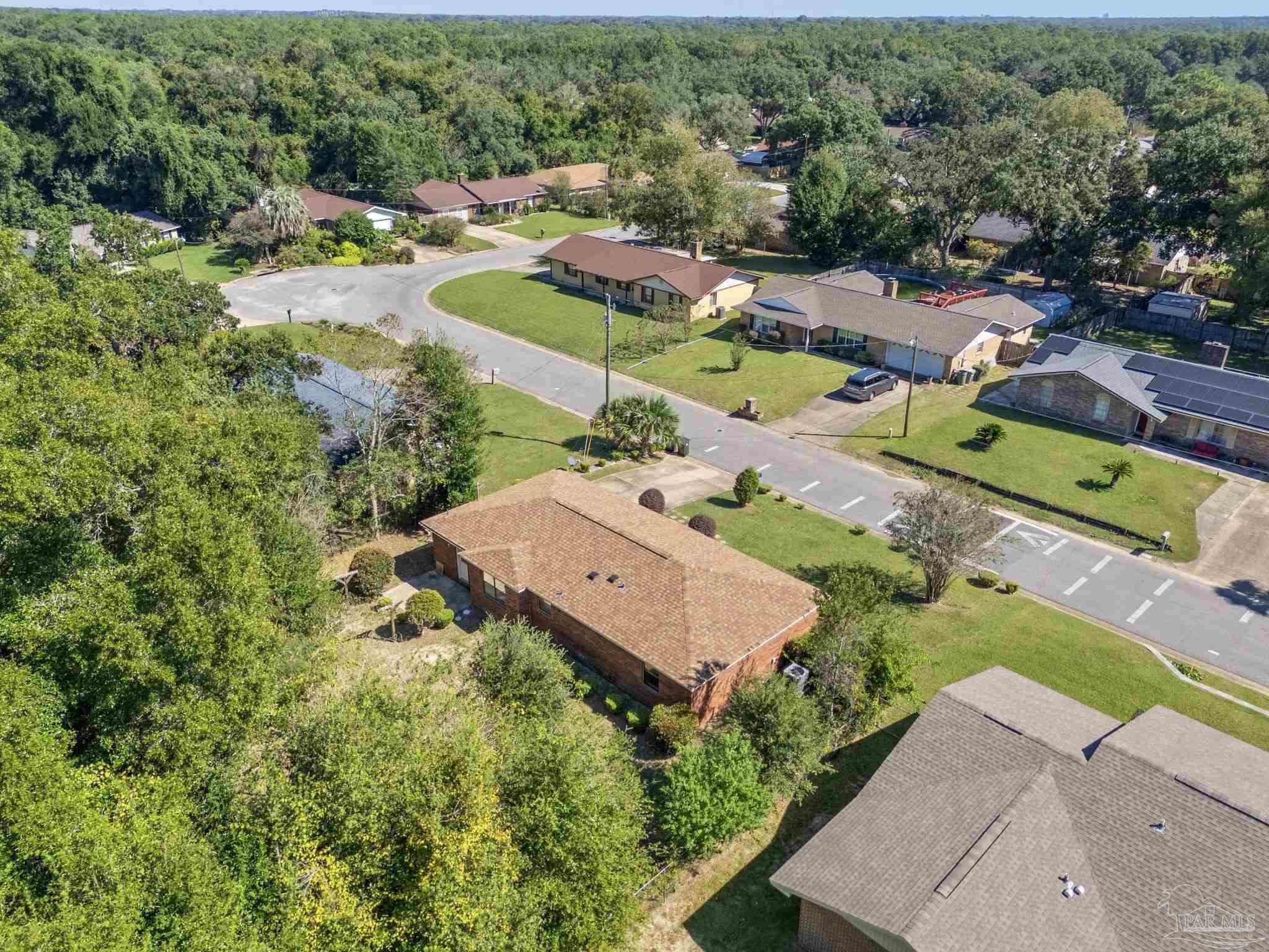 3135 Bent Oak Road Pensacola, FL 32526 - Photo 35 of 47 an aerial view of a house with a garden