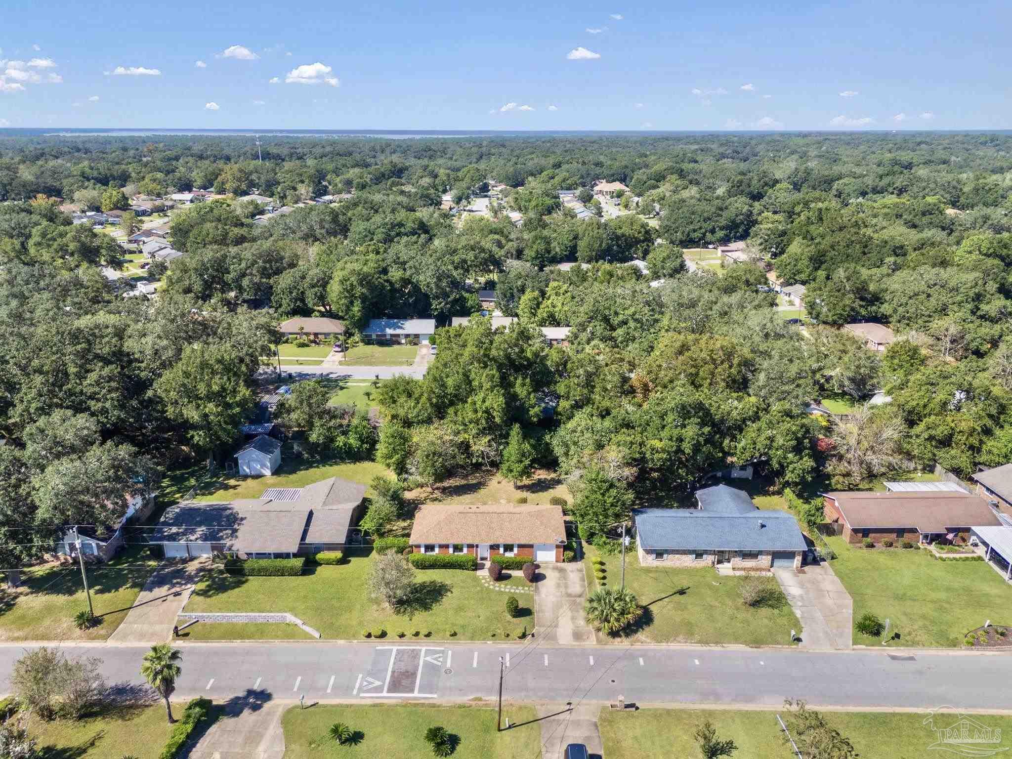 3135 Bent Oak Road Pensacola, FL 32526 - Photo 43 of 47 an aerial view of residential houses with outdoor space and swimming pool