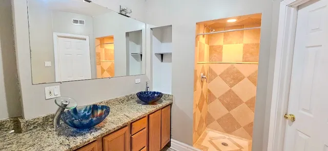 a kitchen with a sink and a window