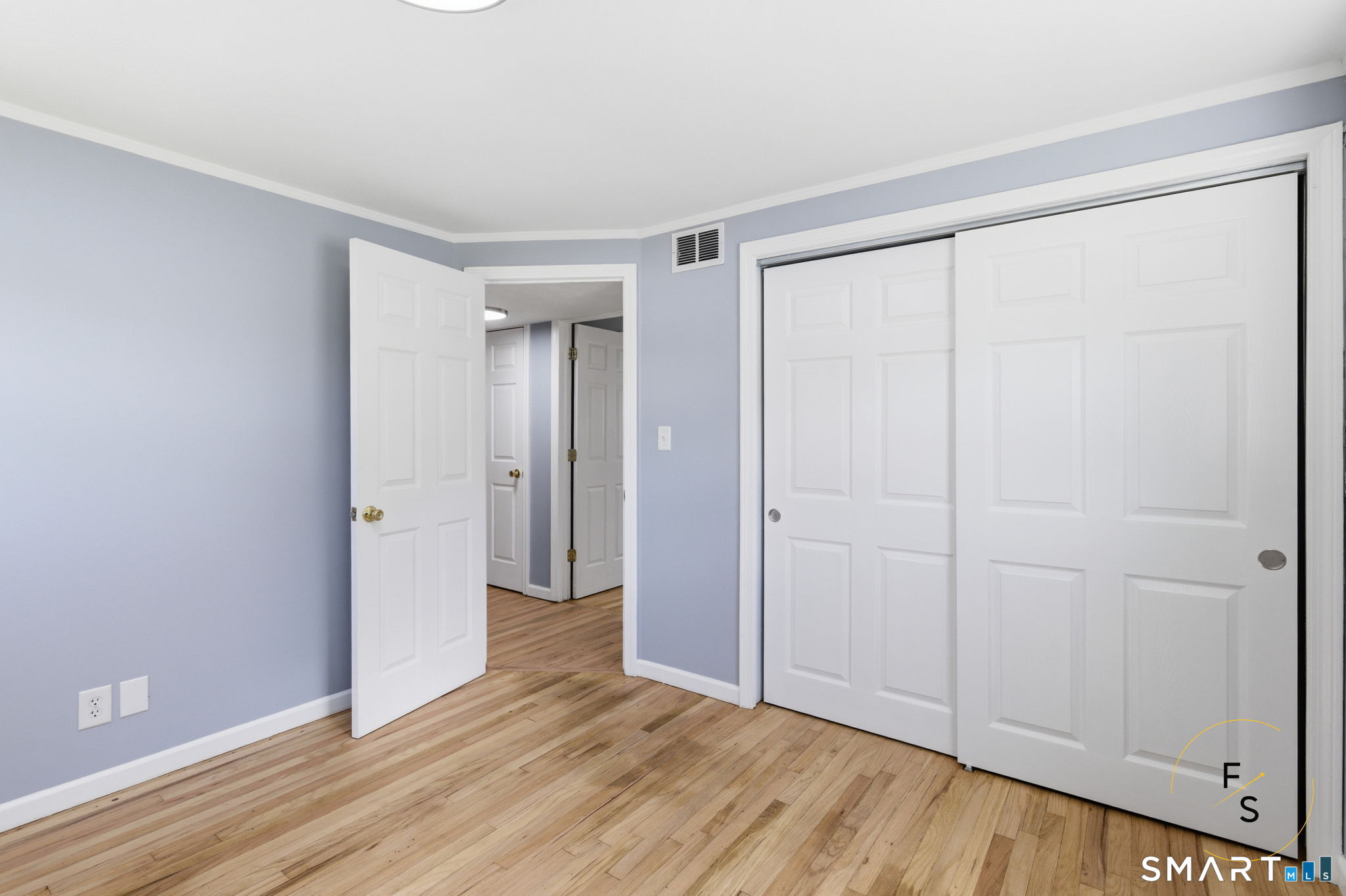 57 Concord Circle Wethersfield, CT 06109 - Photo 15 of 37 a view of an empty room with wooden floor