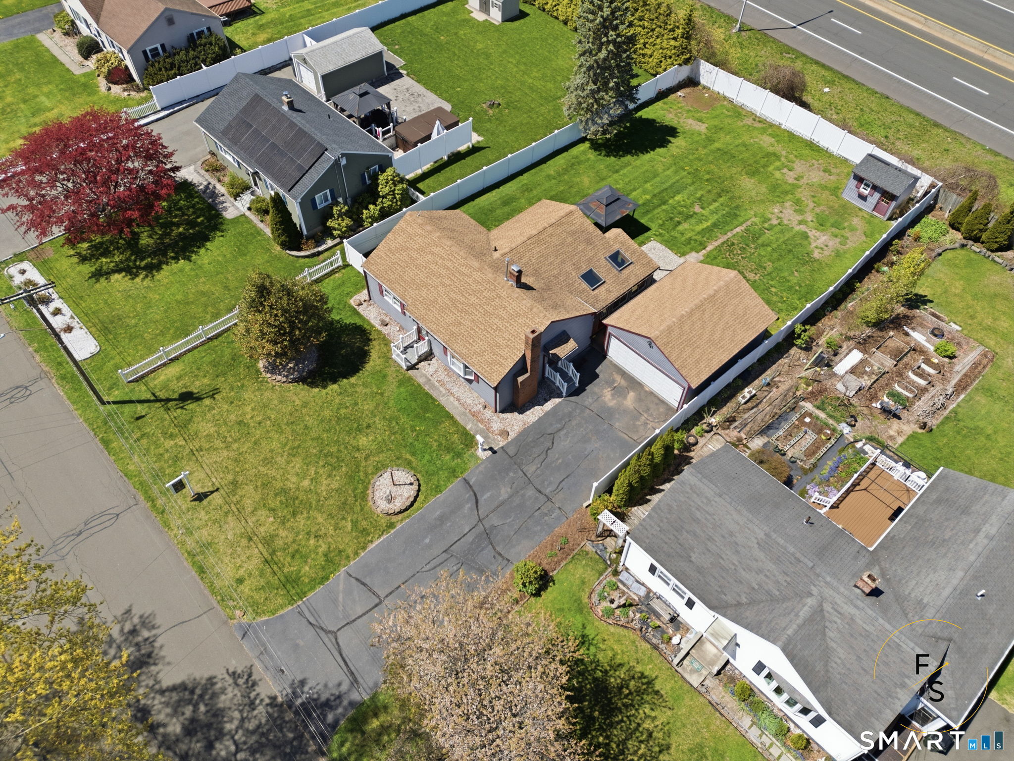 57 Concord Circle Wethersfield, CT 06109 - Photo 33 of 37 an aerial view of a house with a yard