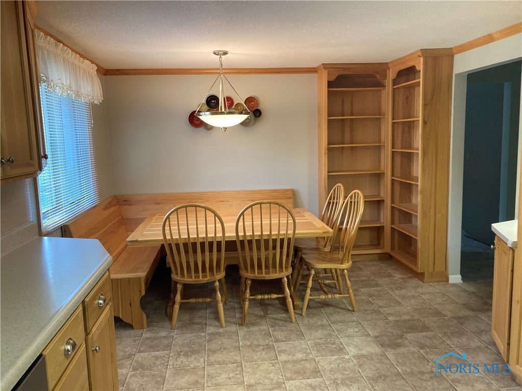 579 3 Rivers Ct. Defiance, OH 43512 - Photo 6 of 25 Custom-built kitchen table stays