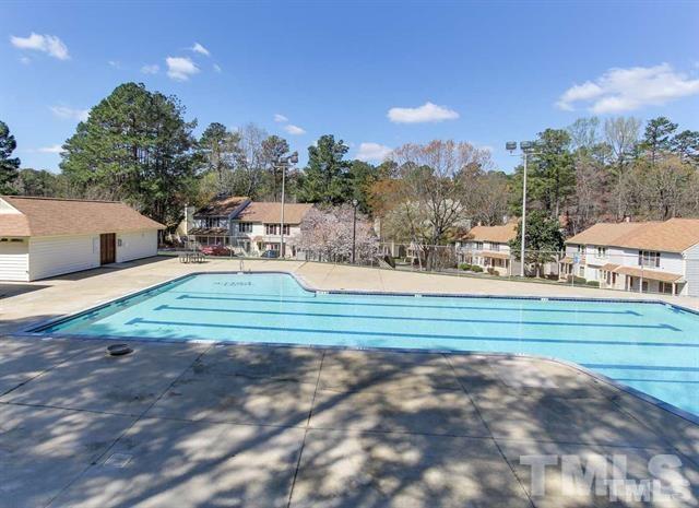 6603 Orford Court Raleigh, NC 27615 - Photo 13 of 14 a childrens park with lots of tress in the background