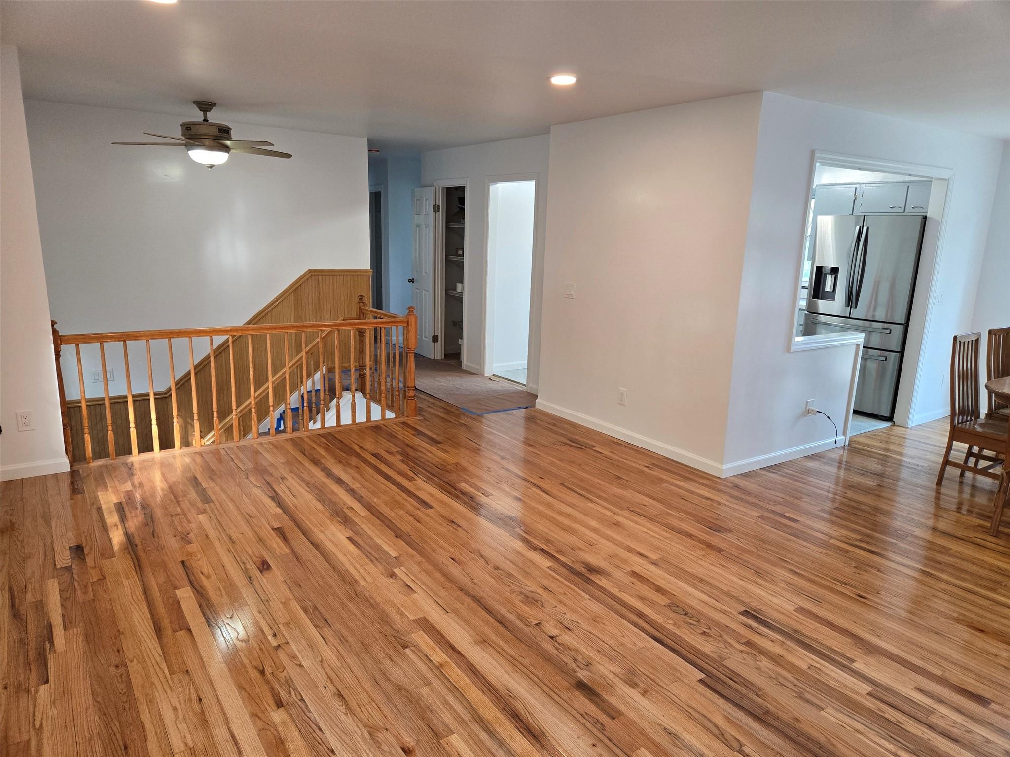 a view of a livingroom with wooden floor