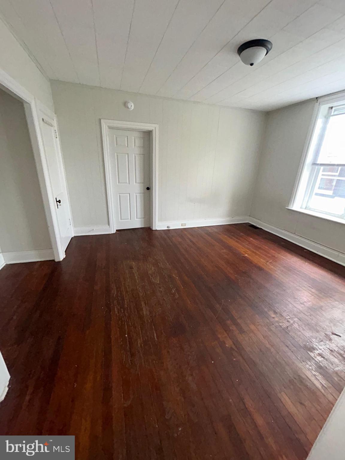 53 Lehman Street, Unit 1 Lebanon, PA 17046 - Photo 5 of 7 a view of bedroom with window and hardwood floor