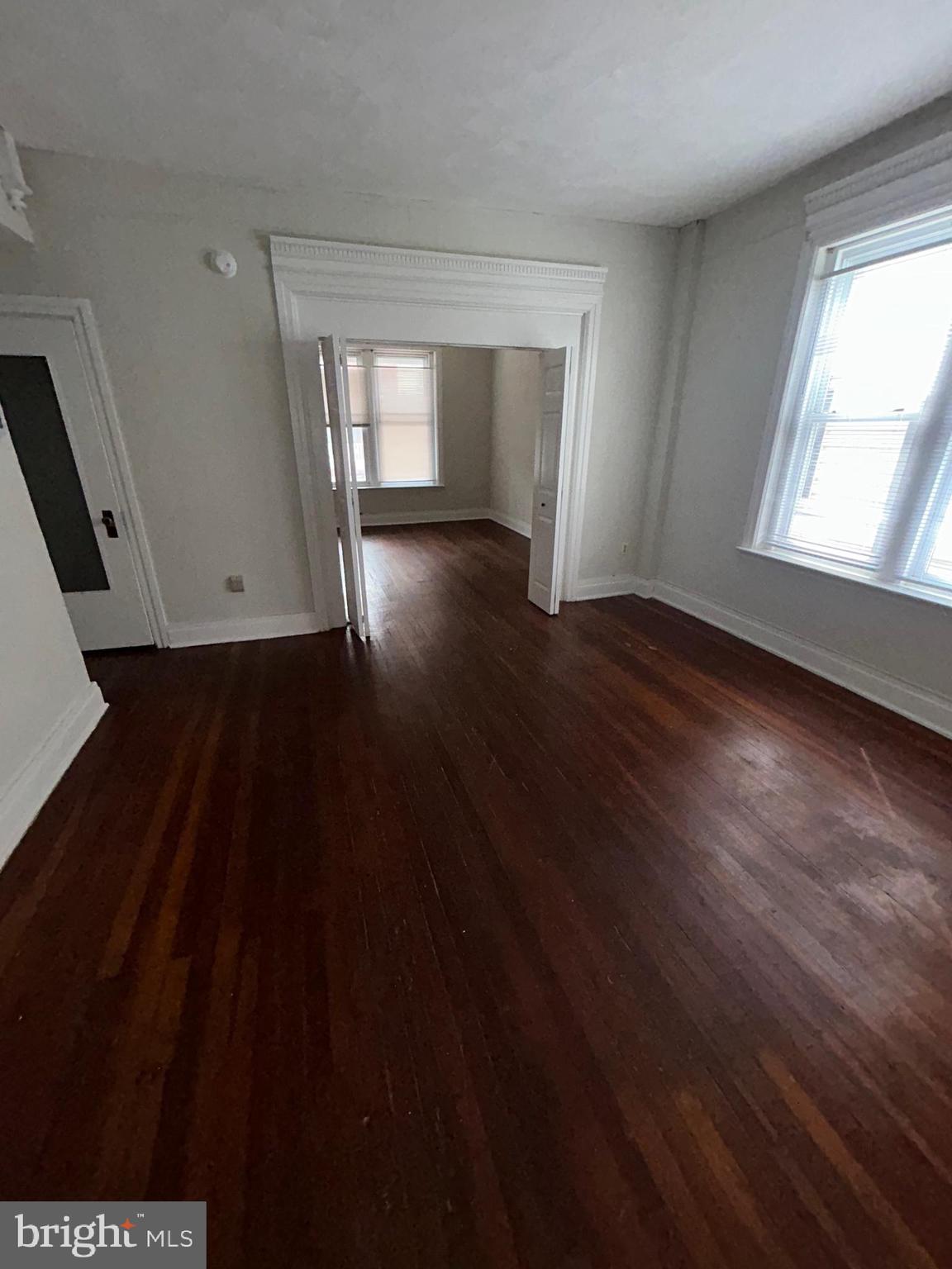 53 Lehman Street, Unit 1 Lebanon, PA 17046 - Photo 6 of 7 a view of empty room with wooden floor and fan