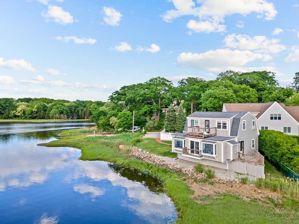 34 Cliff Road Hingham, MA 02043 - Photo 1 of 24 an aerial view of a house with a yard