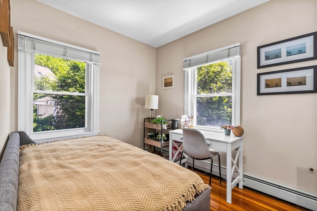 34 Cliff Road Hingham, MA 02043 - Photo 12 of 24 a bedroom with a bed and a window