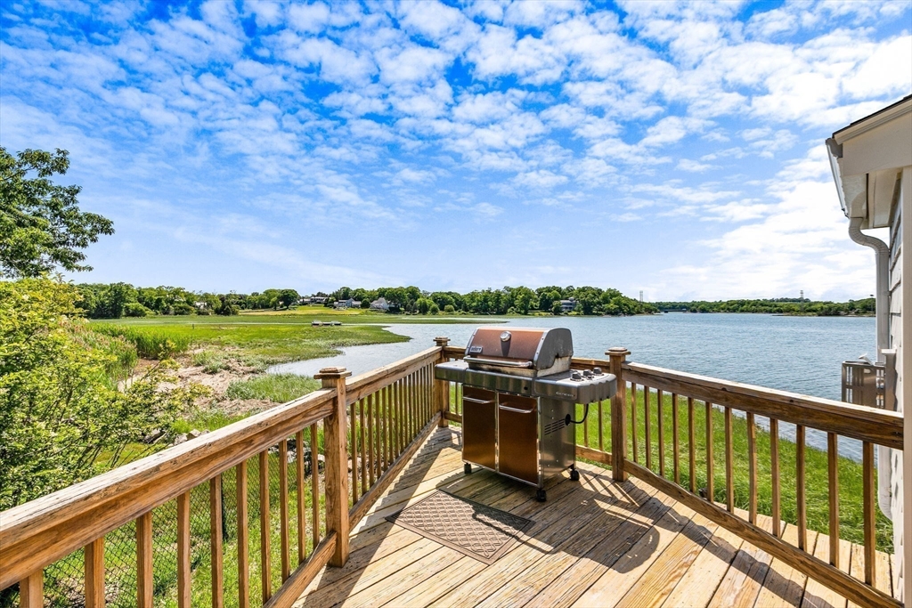 34 Cliff Road Hingham, MA 02043 - Photo 14 of 24 a view of a balcony with wooden floor and fence