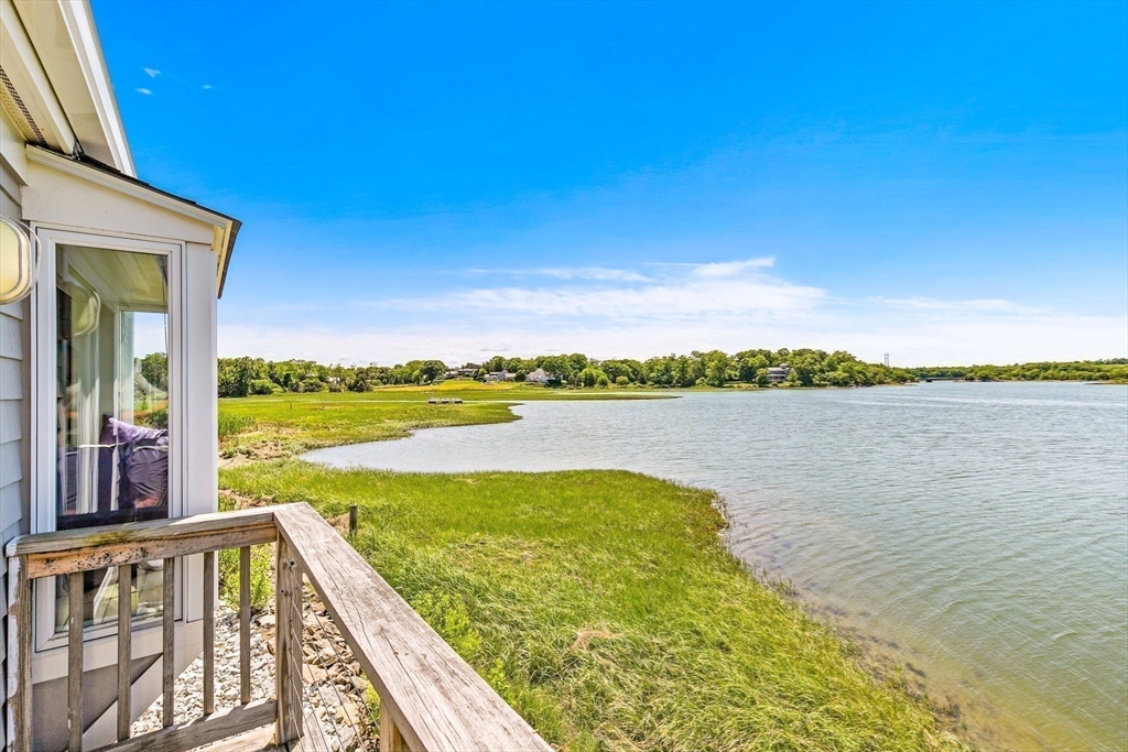34 Cliff Road Hingham, MA 02043 - Photo 16 of 24 a view of an ocean from a balcony