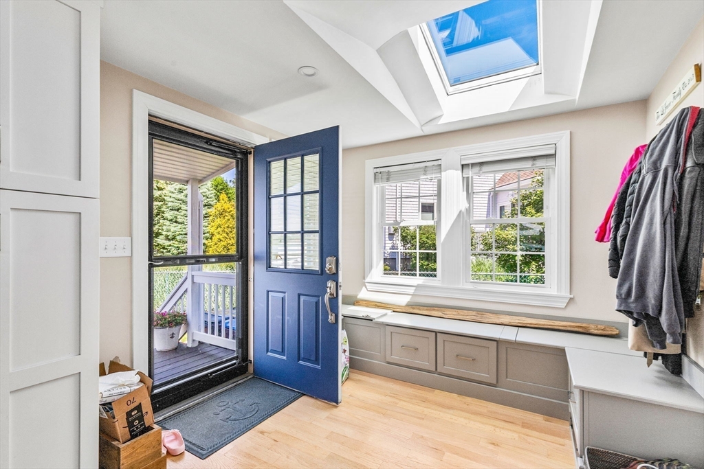 34 Cliff Road Hingham, MA 02043 - Photo 5 of 24 a view of a bedroom with a large window and bed