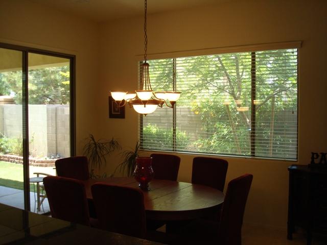 1857 West Periwinkle Way Chandler, AZ 85248 - Photo 4 of 25 Dining area w/ view of back yard