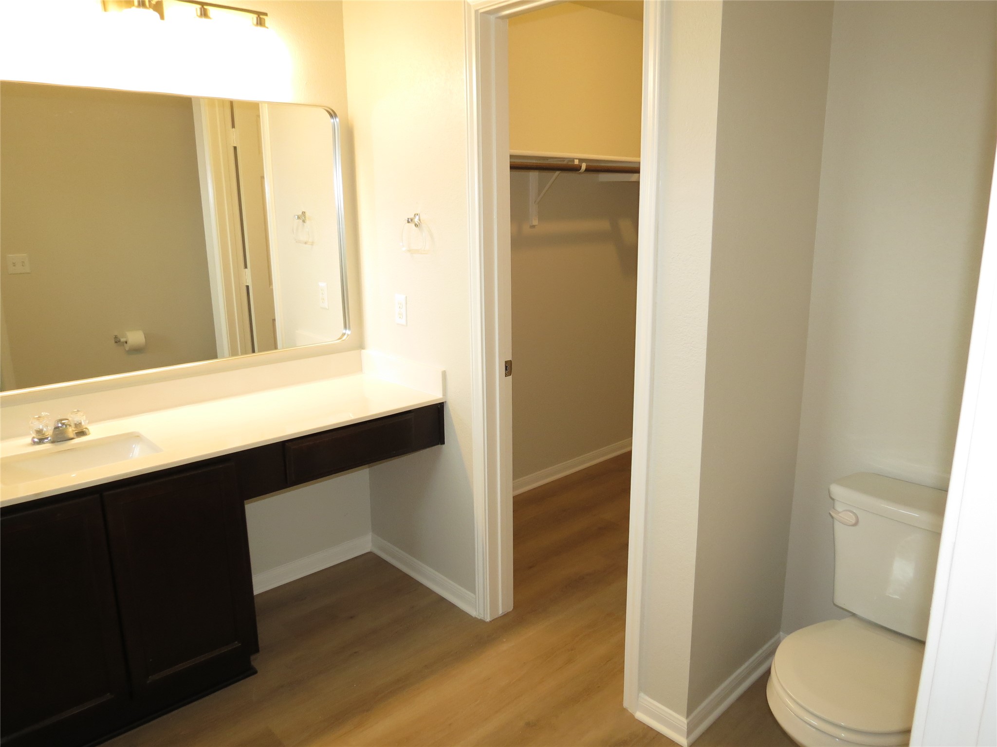375 Musgrav Kyle, TX 78640 - Photo 14 of 31 A well-appointed bathroom vanity with a full-width mirror and ample counter space.