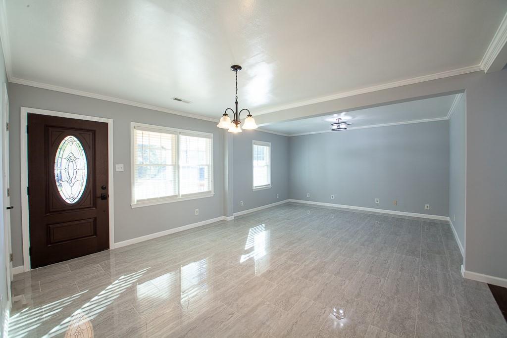 13 Shadow Lane Cartersville, GA 30120 - Photo 15 of 36 a view of an empty room with a window and wooden floor