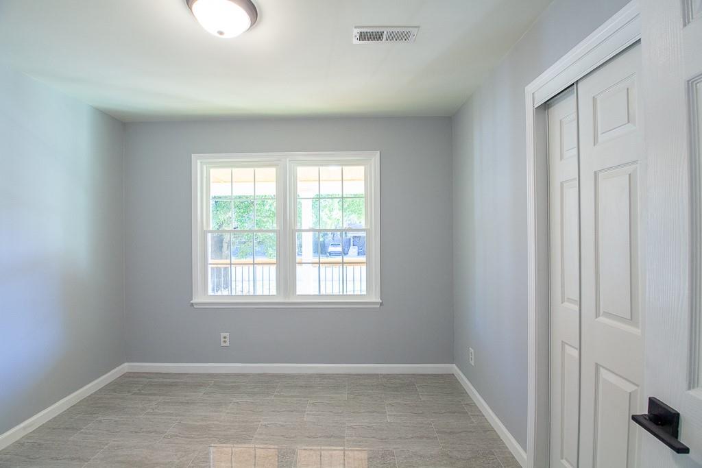 13 Shadow Lane Cartersville, GA 30120 - Photo 28 of 36 an empty room with windows
