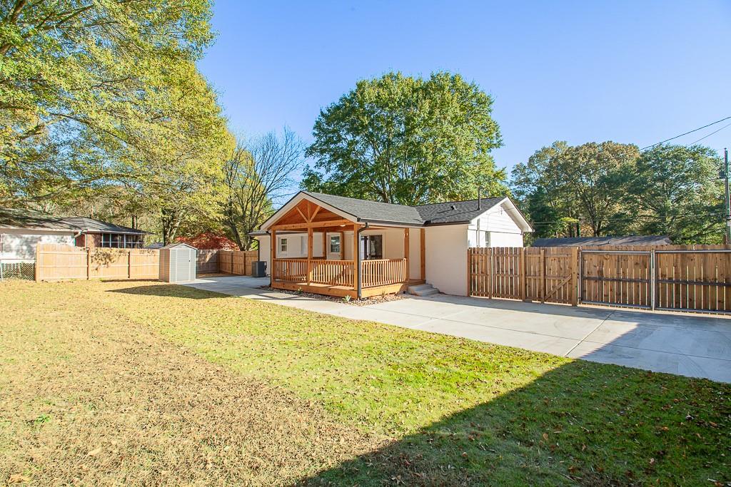 13 Shadow Lane Cartersville, GA 30120 - Photo 7 of 36 a front view of a house with a yard and garage