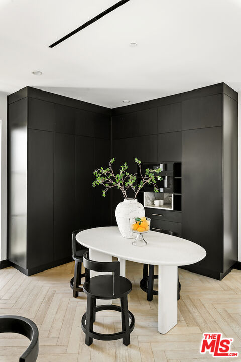 10932 Savona Road Los Angeles, CA 90077 - Photo 24 of 72 a view of a dining room with furniture