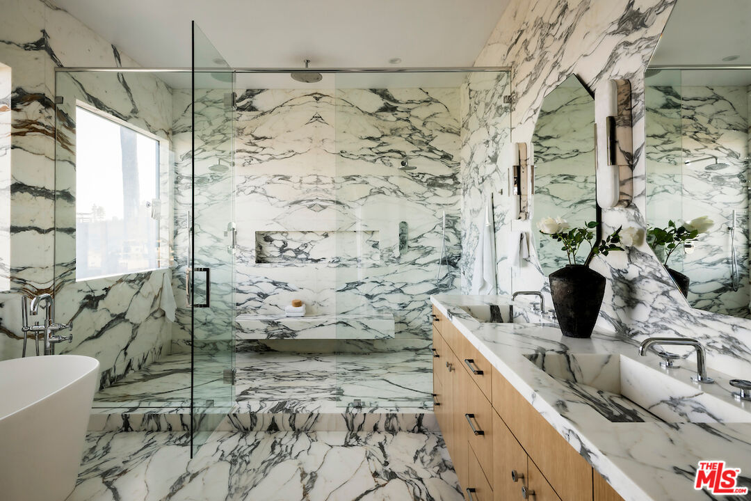 10932 Savona Road Los Angeles, CA 90077 - Photo 43 of 72 a bathroom with a shower and a sink