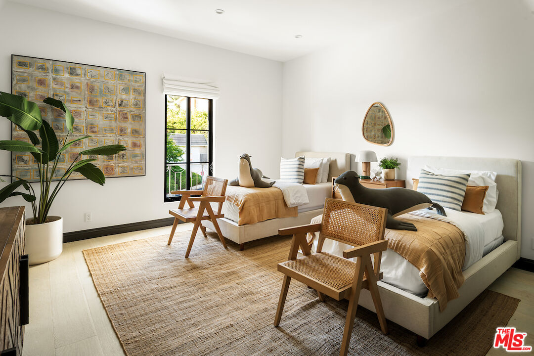 10932 Savona Road Los Angeles, CA 90077 - Photo 56 of 72 a living room with furniture and a large window