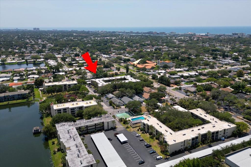 11485 Oakhurst Road, Unit 200321 Largo, FL 33774 - Photo 24 of 28 an aerial view of residential houses with city view