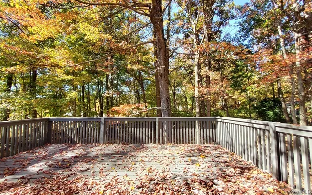 a view of a wooden fence