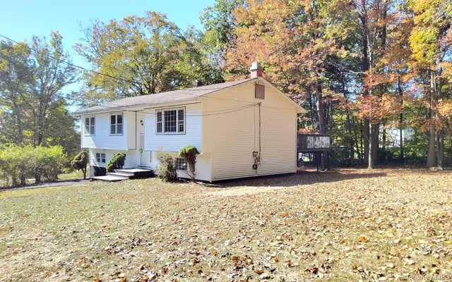 a view of a house with a patio