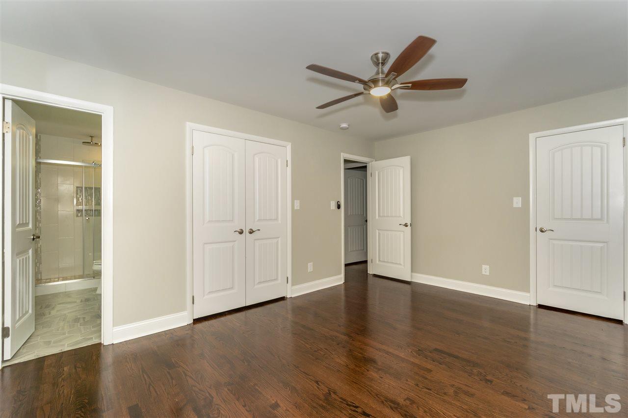 720 Dartmouth Road Raleigh, NC 27609 - Photo 17 of 25 Master Bedroom with Gorgeous Hardwood Floors and Double Closets.