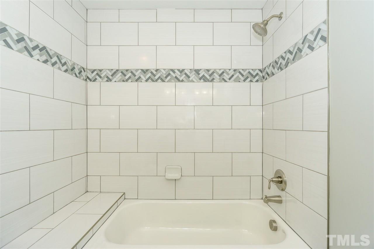 720 Dartmouth Road Raleigh, NC 27609 - Photo 23 of 25 Pretty New Tiled Tub/Shower.