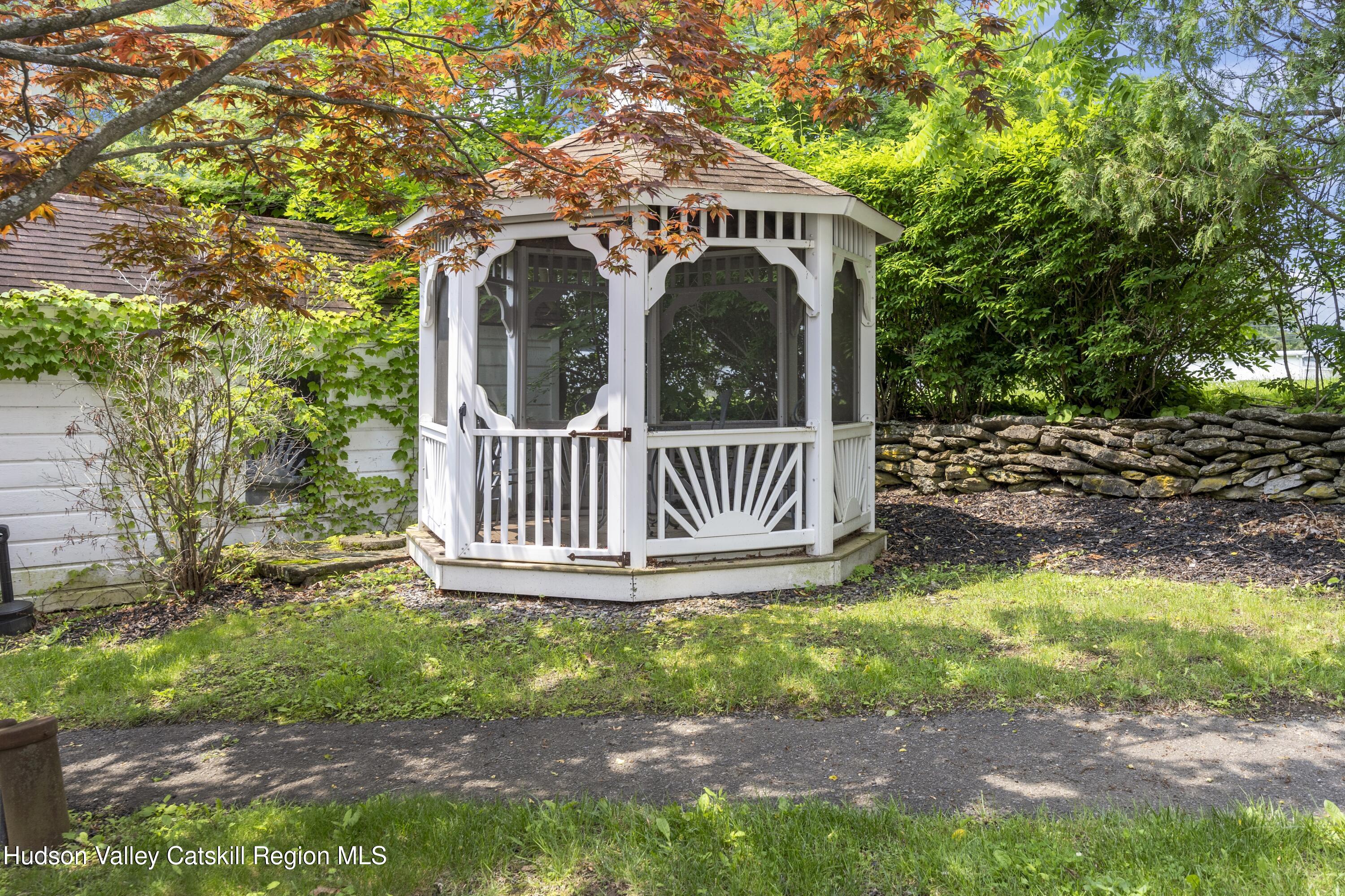 207 Maple Avenue Germantown, NY 12526 - Photo 2 of 8 a view of an house with backyard and sitting area